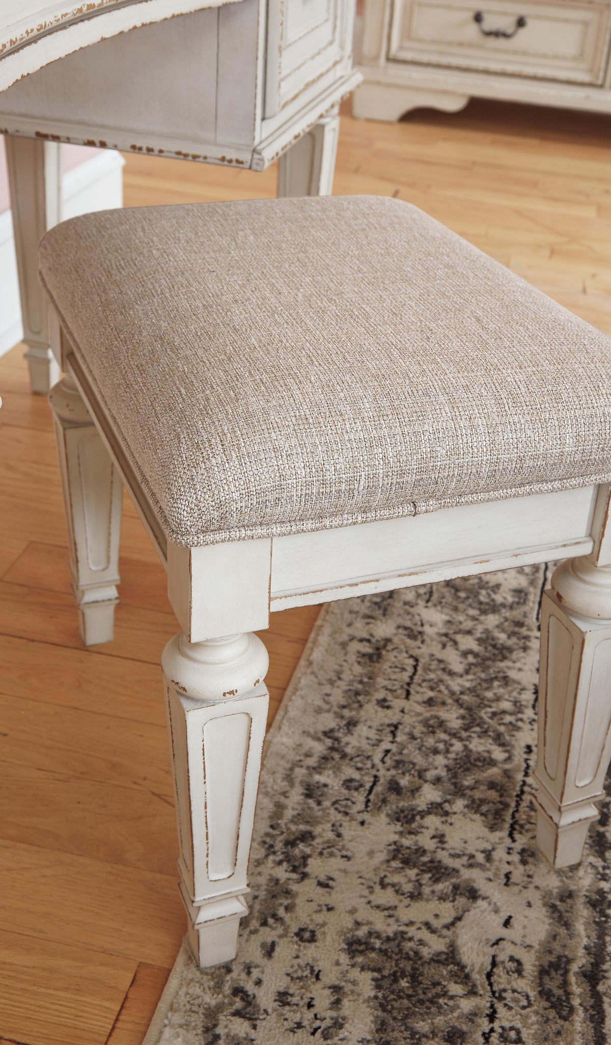 Realyn King Panel Bed, Dresser, Mirror, Chest, Vanity and Nightstand