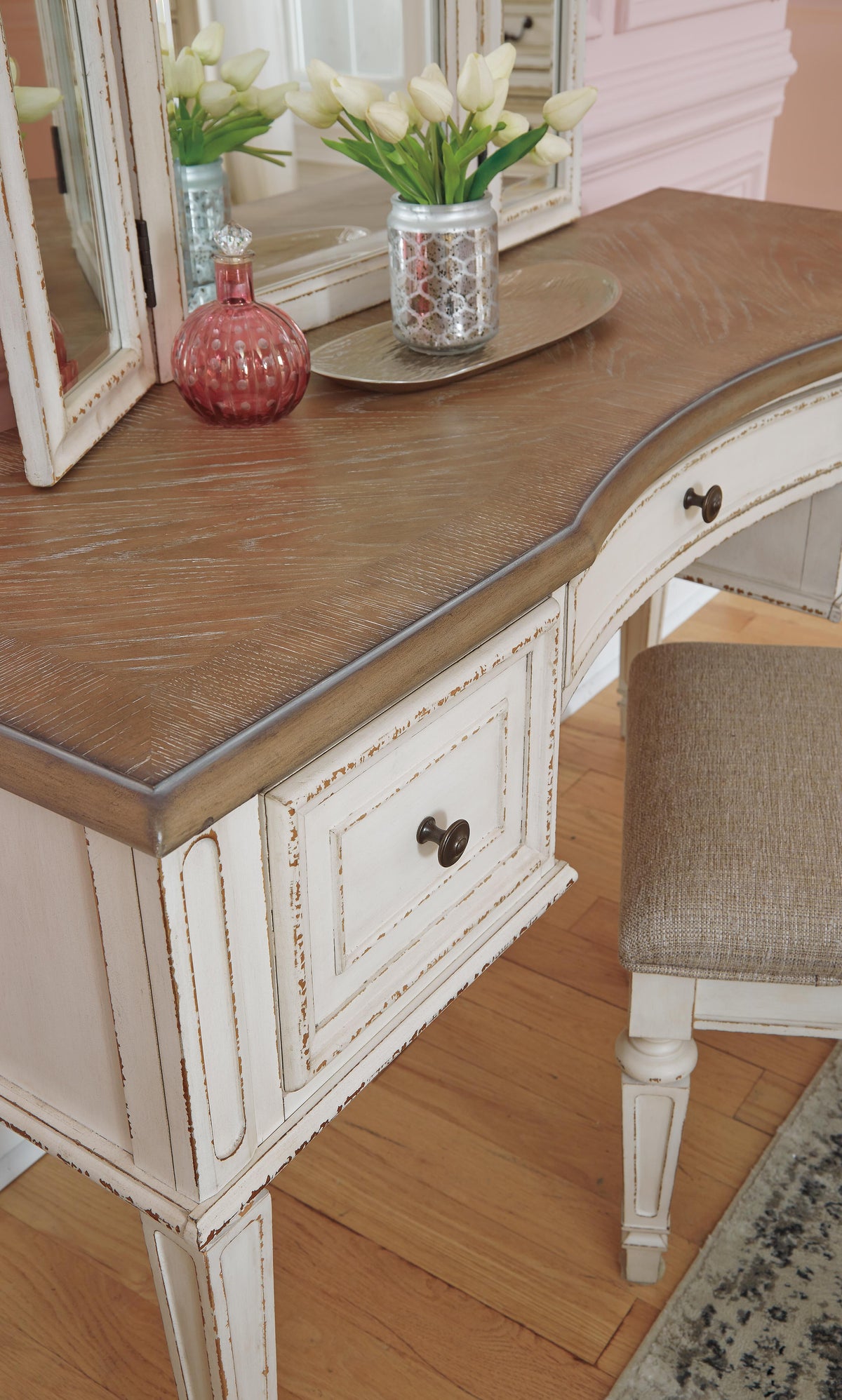 Realyn Queen Upholstery Panel Bed, Dresser, Chest, Nightstand, and Vanity Set