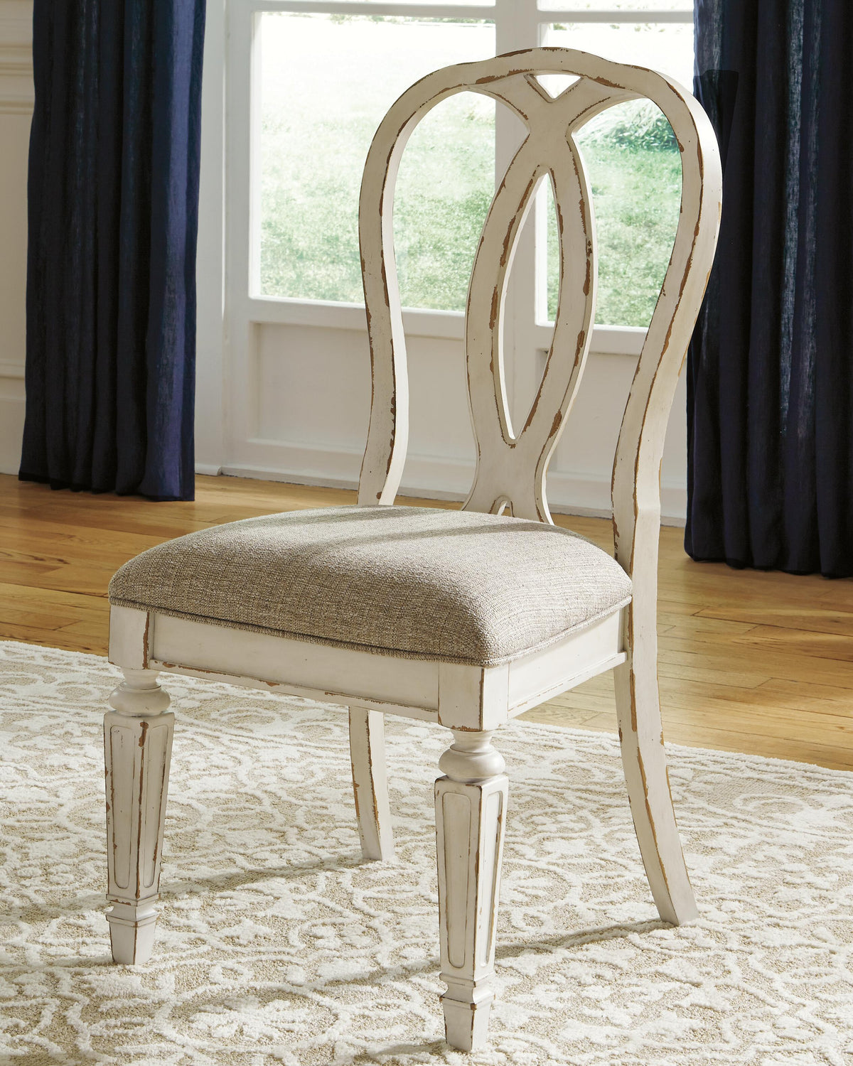 Realyn Dining Table with 8 Chairs