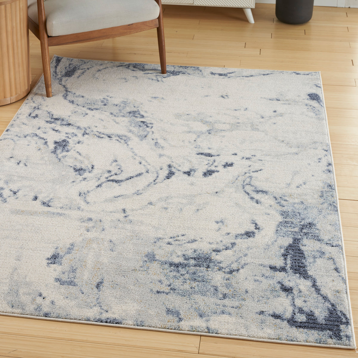 Motion MTT06 Ivory Blue Rug - room scene